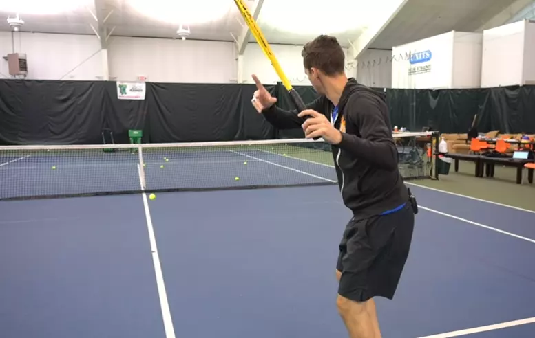 Does Tennis Ball Machine Improve Game describing shot